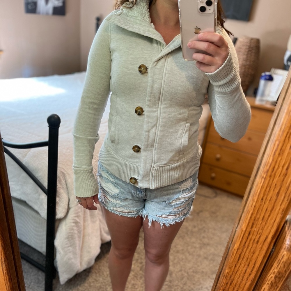 SO button sweater